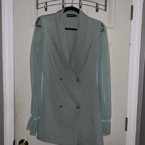 Cute mint colored suit dress.